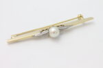 Nål i gult gull med kulturperle
