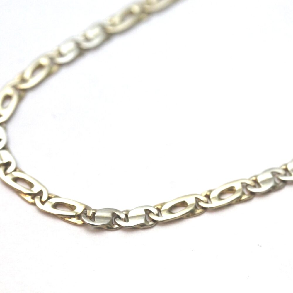 Smykke i flerfarget gull