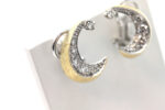 Ørepynt i hvitt og gult gull med diamanter